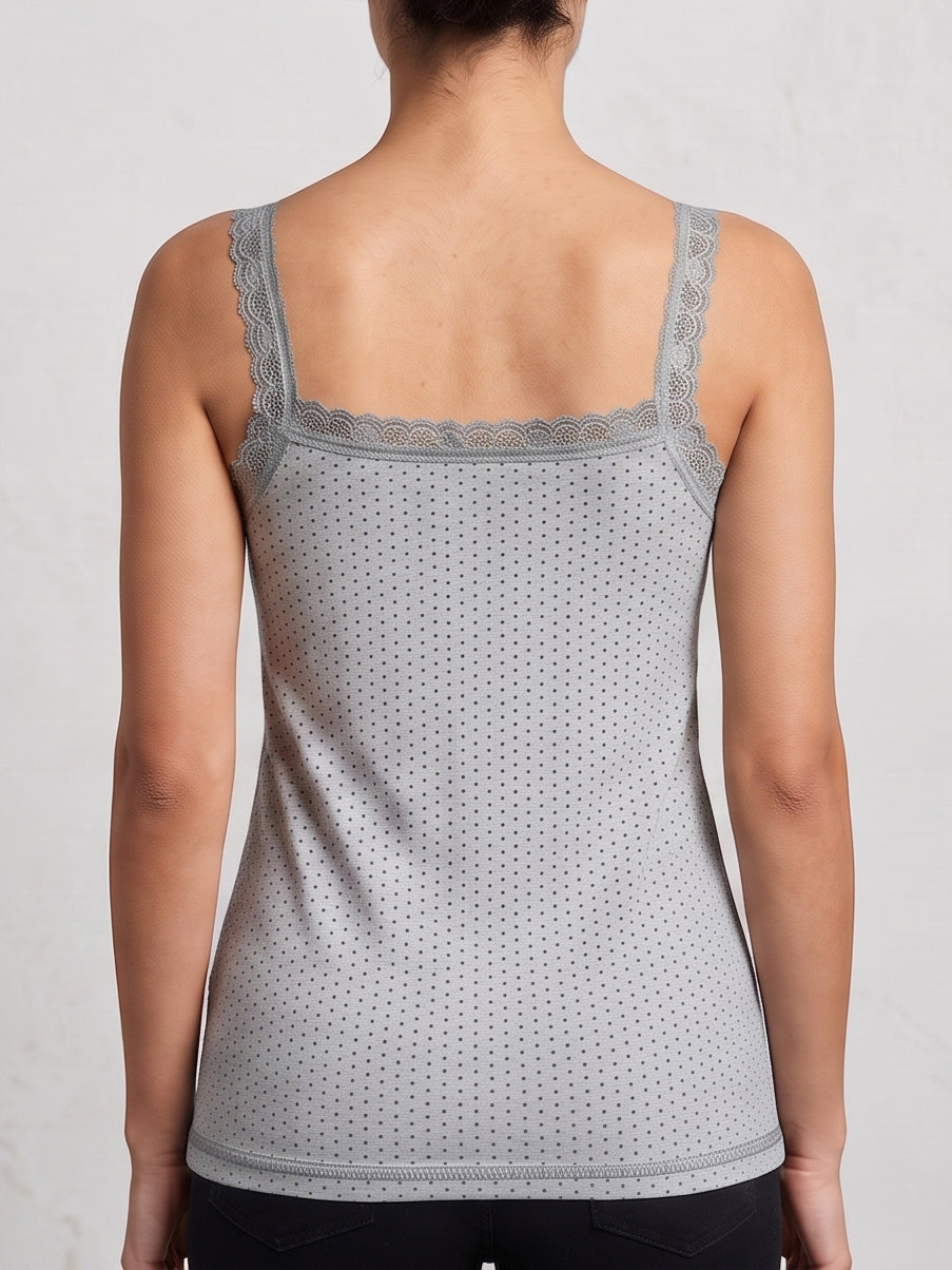 A woman shown from the back wearing a light gray sleeveless camisole top with a delicate lace trim along the scoop neckline and a subtle polka dot pattern.